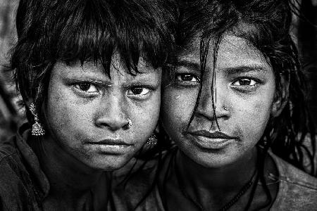 Two indian girls at the Kumbh Mela in Prayagraj - India