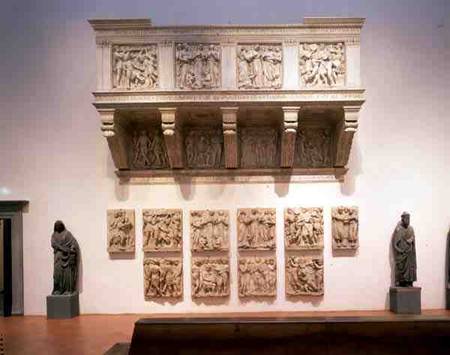 Reconstructed Cantoria, with the original panels below a Luca Della Robbia