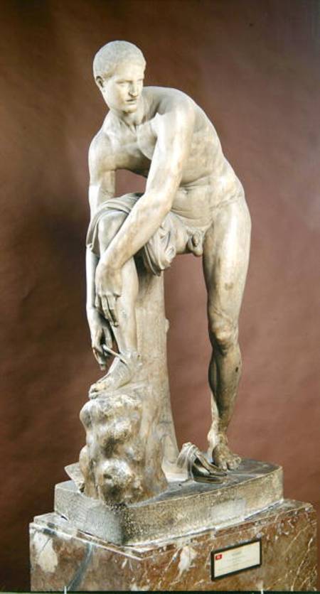 Hermes tying his sandal, Roman copy of a Greek original attributed to Lysippos a Lysippos