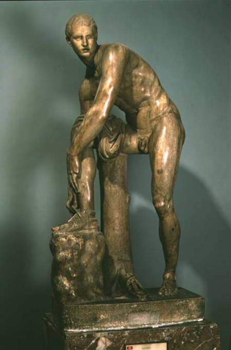 Hermes tying his sandal, Roman copy of a Greek original attributed to Lysippos a Lysippos