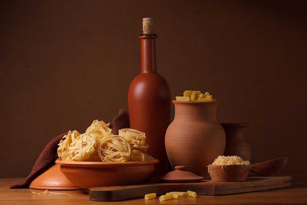 Still life with pasta and ceramic ware a magnola