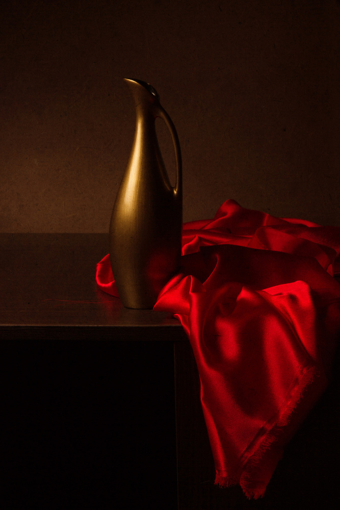 Still life with red cloth a magnola