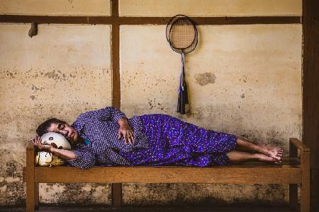 Resting woman and her doll