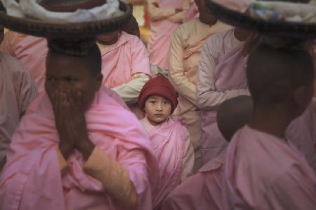 The Alms Round of Buddhist Nun