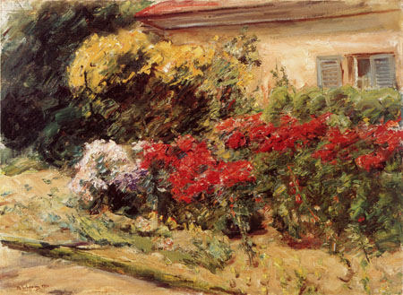 shrubs of flowers in front of the cottage of the gardener a Max Liebermann
