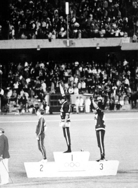 1968 Olympic Games. Mexiko City. Mens 200 m. TOMMIE SMITH, USA, Gold, and J. CARLOS, Bronze, in Blac a 