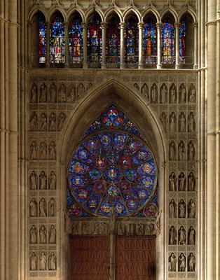 View looking west from the nave, rose window designed by Bernard de Soissons, with surrounding statu a 