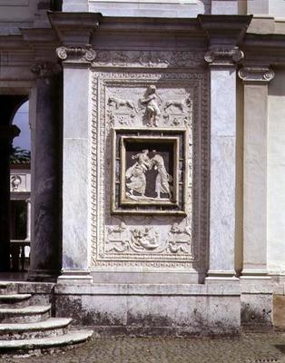 The first courtyard, detail of an antique low relief from the collection of Giulio III, incorporated a 