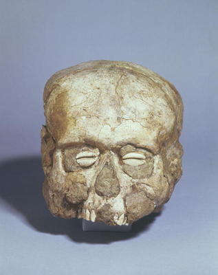 Portrait skull with cowrie shell eyes, Jericho c.7th millennium BC (skull, plaster and shell) a 