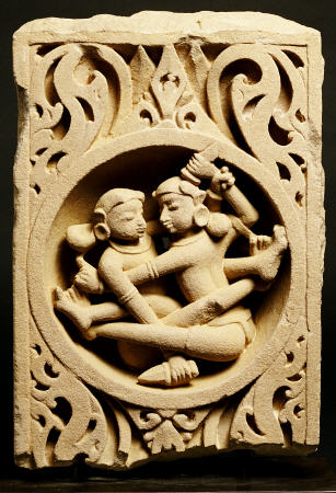 A Central Indian Pale Pink Sandstone Panel Depicting A Fighting Couple Each Armed With A Dagger a 