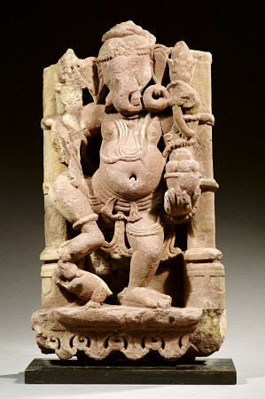 A Central Indian, Rajasthan, Red Sandstone Figure Of Ganesha Standing With His Right Leg On His Vehi a 