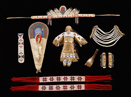 A Collection Of Objects Including Plains Beaded Necktie,  Model Cradleboard, Doll And Neck Ornament a 