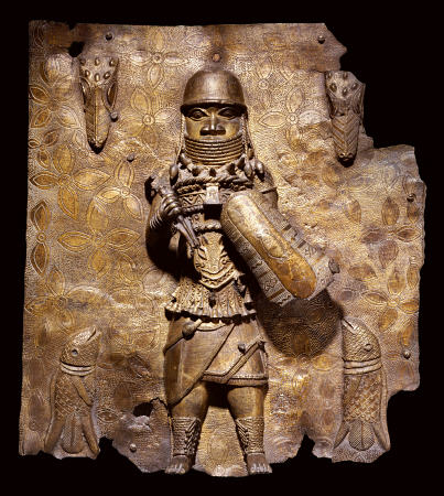 A Fine Benin Bronze Plaque In High Relief With A Warrior Chief, Full Length, In Elaborate Battle Dre a 
