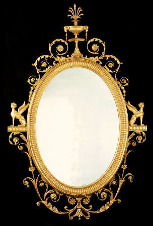 A George III Giltwood Mirror After Design By Robert Adam (1728-1792) a 