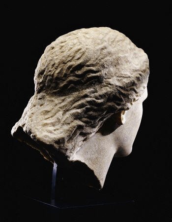 A Greek Marble Female Head From Behind a 