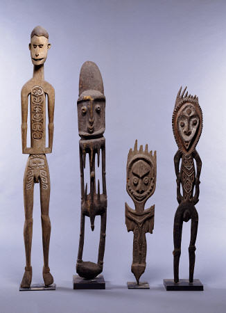 A Group Of Melanesian Figures Including An Asmat And Southern Abelam Male Figures And Karawari Cave a 