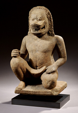 A Khmer, Angkor Vat Style, Sandstone Figure Of A Lion-Headed Guardian, 12th Century, 55 cm high a 