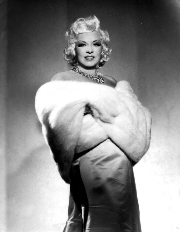 American Actress Mae West with fur stole a 