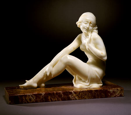 An Art Deco Alabaster Figure Modelled As A Nude Female Bather a 