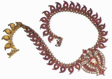 An Indian Ruby And Diamond Necklace With a Centre-Piece Designed As A Double-Peacock and Set With Ta a 