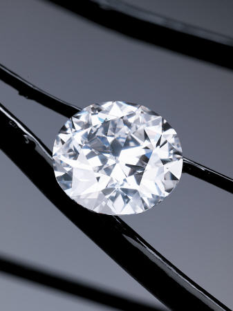 An Unmounted Circular-Cut Diamond Weighing 50 a 