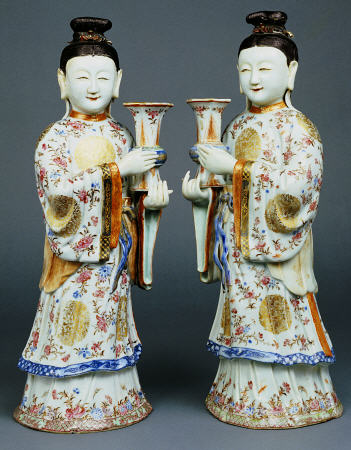 A Pair Of Famille Rose Candle Holders Modelled As Standing Ladies a 