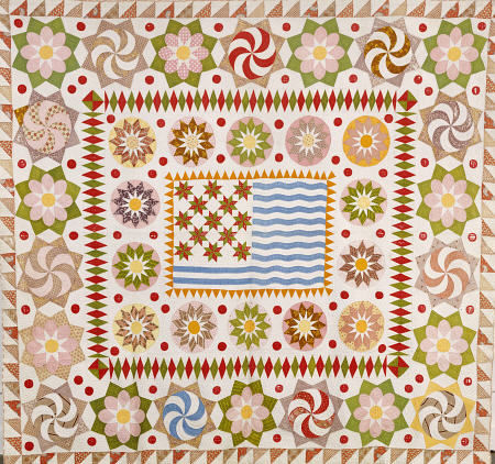 A Pieced And Appliqued Cotton Quilted Coverlet, a 