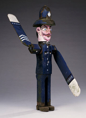 A Polychrome Wood And Metal Whirligig Modelled As A Police Sergeant, 20th Century a 