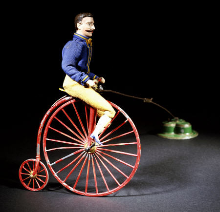 A Rare Clockwork  ''Blondin'' Cyclist -Painted Lead Figure, a 