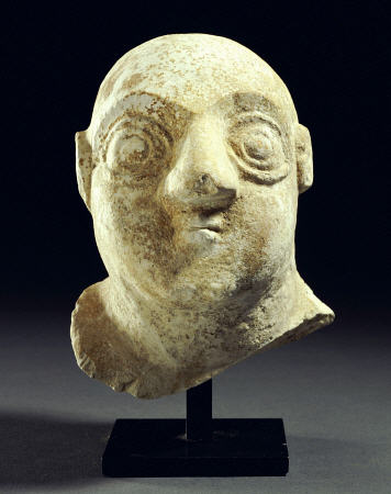 A Sumerian Limestone Head Of A Worshipper a 