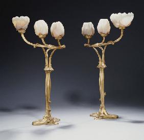 A Magnificent Pair Of Gilt Bronze And Carved Glass Magnolia Lamps By Louis Marjorelle (1859?1926), A