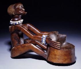 A Songye Female Bowl Bearer Carving