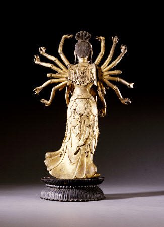 Back View Of A Well-Cast Gilt-Bronze Figure Of A Multi-Armed Bodhisattva a 