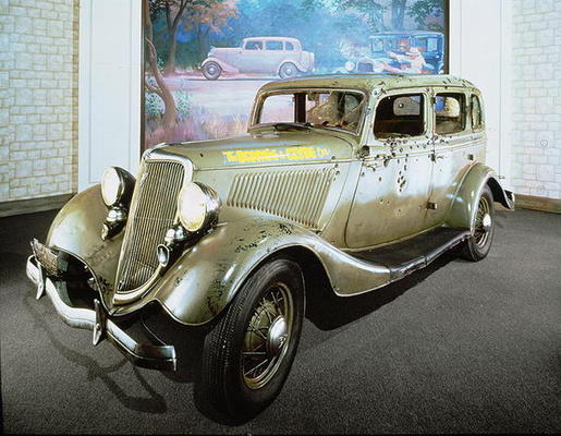Bonnie and Clyde's 'bullet-riddled' Ford Sedan (colour photo) a 