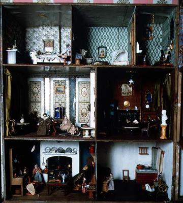 Doll's house showing original wallpapers and furnishings a 