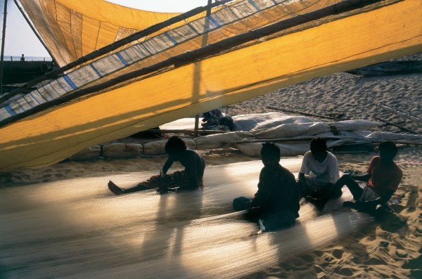 Fishermen mending nets, Gopalpur (photo)  a 