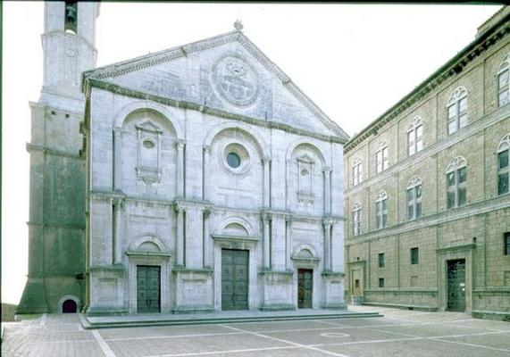 Facade of the Cathedral designed by Bernardo Rossellino (1409-64), the pediment bearing the papal ar a 