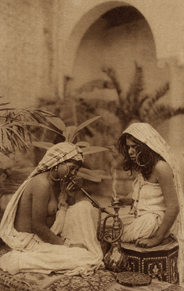 Harem girls smoking a hookah, from an early 20th century postcard (sepia photo)  a 