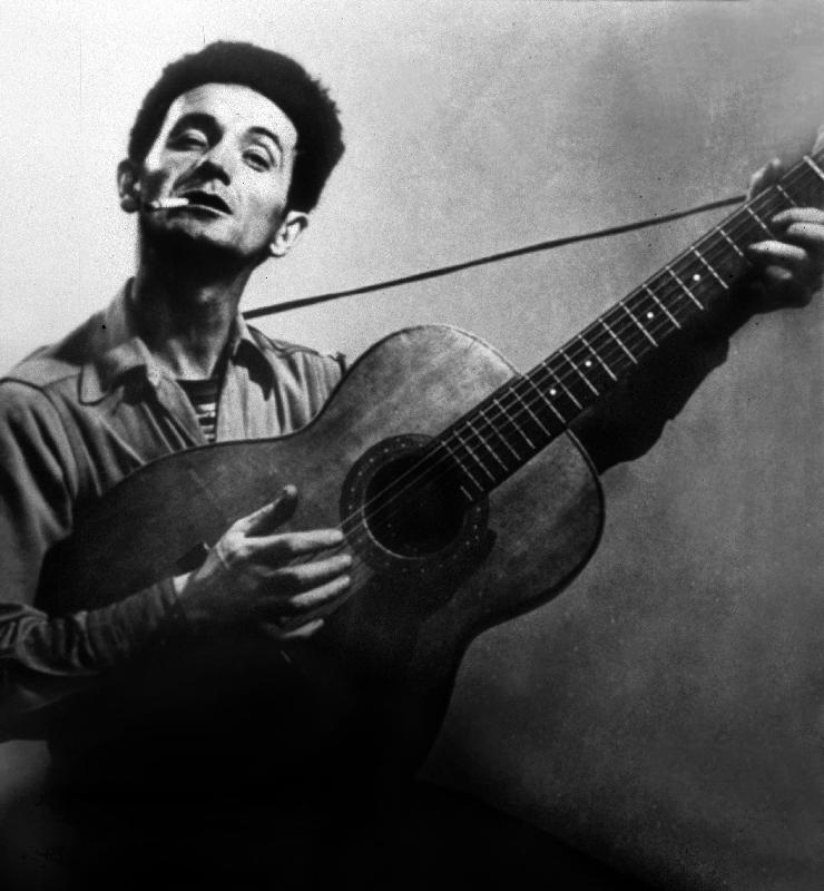 Musician Woody Guthrie considered as the father of folk music a 