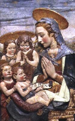 Madonna and Child with three cherubs, bas relief by Antonio Rossellino (1427-79) (tin glazed earthen a 