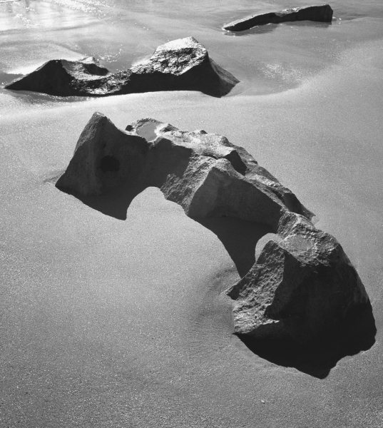Rock on sand (b/w photo)  a 