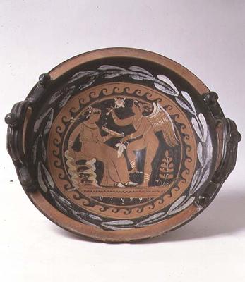 Red-figure patera depicting winged Eros and seated female figure, Greek (pottery) a 