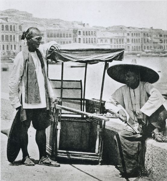 Sedan chair in Hong Kong, 1873 (b/w photo)  a 