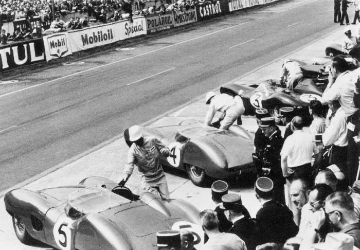 Start of the Le Mans 24 Hours, France, 1959. Roy Salvadori prepares to climb aboard his Aston Martin a 