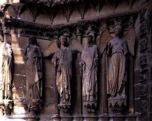 St. Nicaise flanked by two angels, sculptures on the exterior West Facade, 14th century originals (s a 