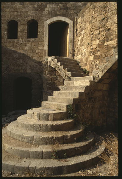 The castle of Saint-Gilles, detail, view of a stair (colour photo)  a 