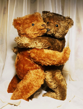 Two Steiff Teddy Bears Embracing a 