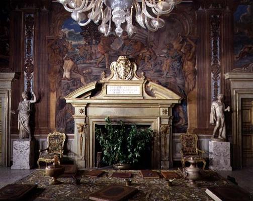 The entrance hall, detail of the fireplace decorated with the coat of arms of Cardinal Pietro Aldobr a 