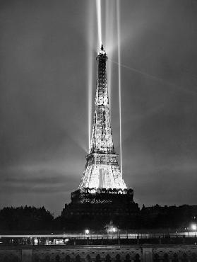 World fair in Paris: illumination of the Eiffel Tower by night