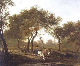 Two peasants with a herd of cattle on a wooded path leading to a lake